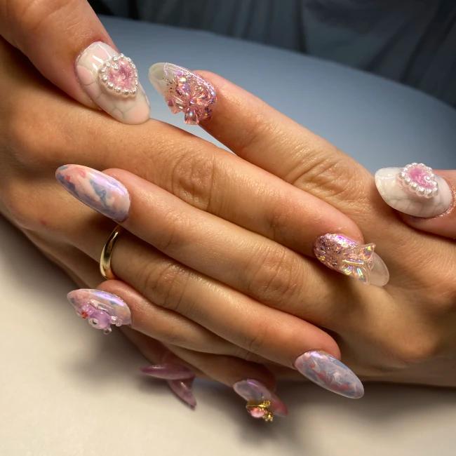 Pastel princess-themed hand painted nail designs by The Dreamy Nails in Sydney